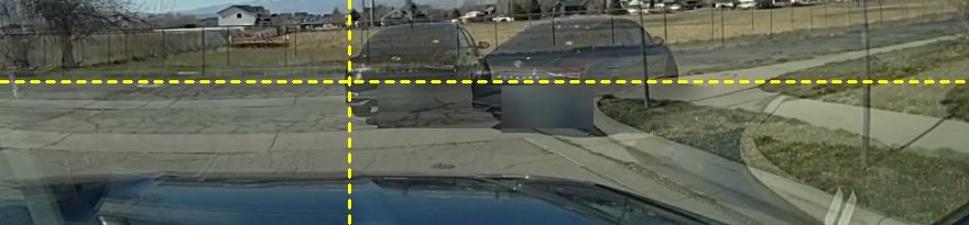 The control comparison: two frames 1.5 seconds apart while the car was turning, blended half and half. The car appears in two different places.