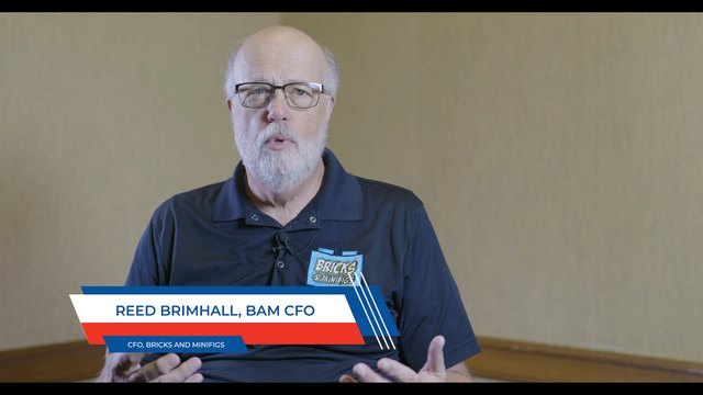 Reed Brimhall in a Bricks & Minifigs polo, on-screen caption REED BRIMHALL, BAM CFO, CFO, BRICKS AND MINIFIGS