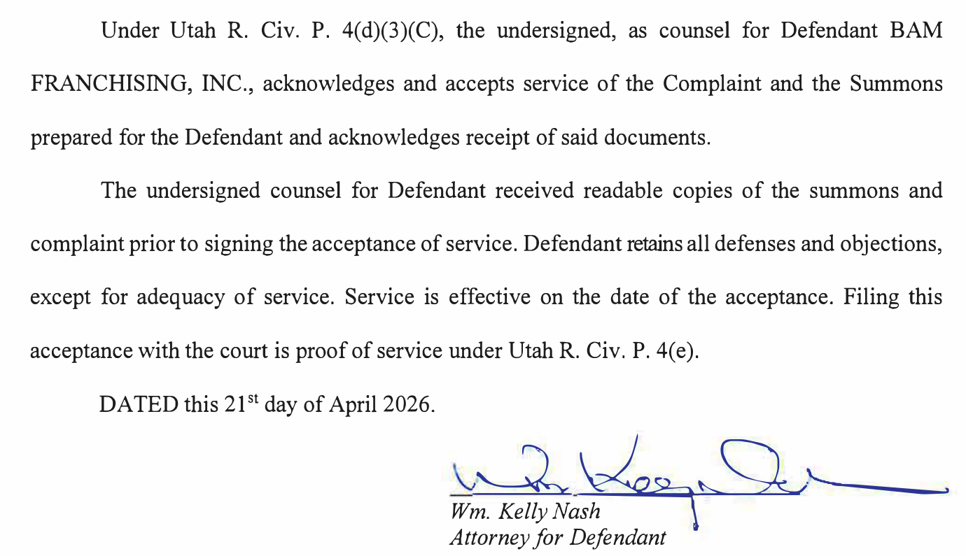 The Acceptance of Service in BAMF Salem 1, LLC v. BAM Franchising, Inc.: counsel for defendant accepts service of the complaint and summons, service effective on the date of the acceptance, dated the 21st day of April 2026, signed Wm. Kelly Nash, Attorney for Defendant